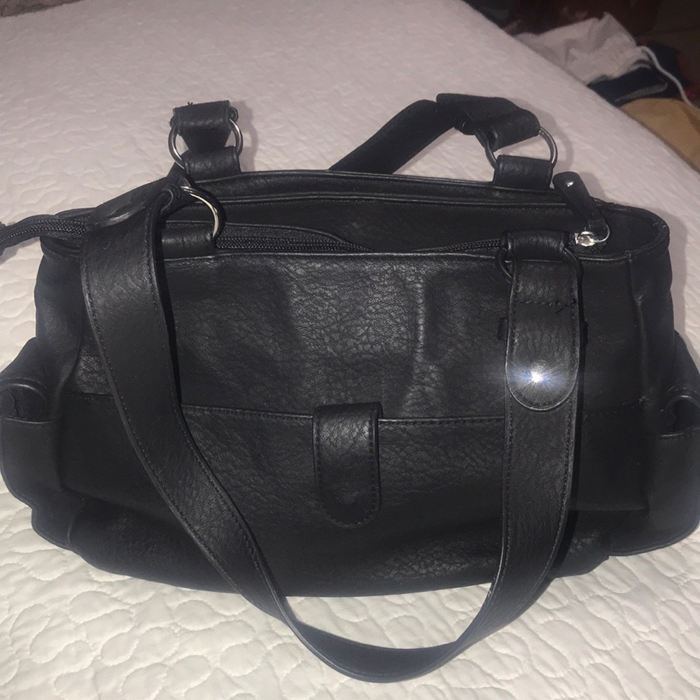 I am selling  a Black Purse.